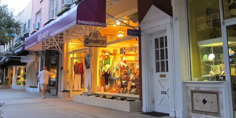 Illuminated boutique stores in downtown Orlando, ideal for adults exploring things to do in downtown Orlando for adults and unique finds.