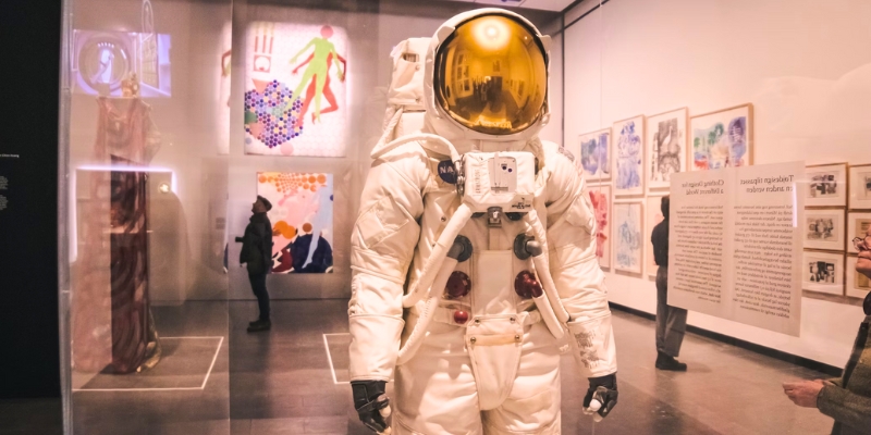 An astronaut suit on display in a museum, representing the legacy of space travel in Orlando, Florida.