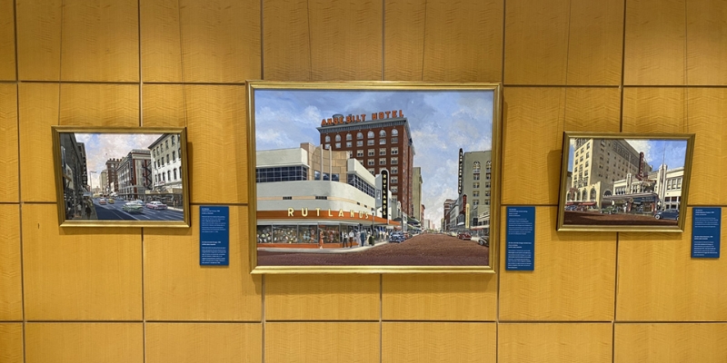 Three paintings showcased on the wall of the Orange County Regional History Center, located in downtown Orlando, Florida.
