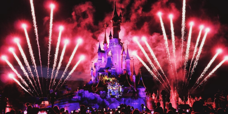 A vibrant fireworks show lights up the night sky at Walt Disney Orlando, marking the New Year with excitement and joy.
