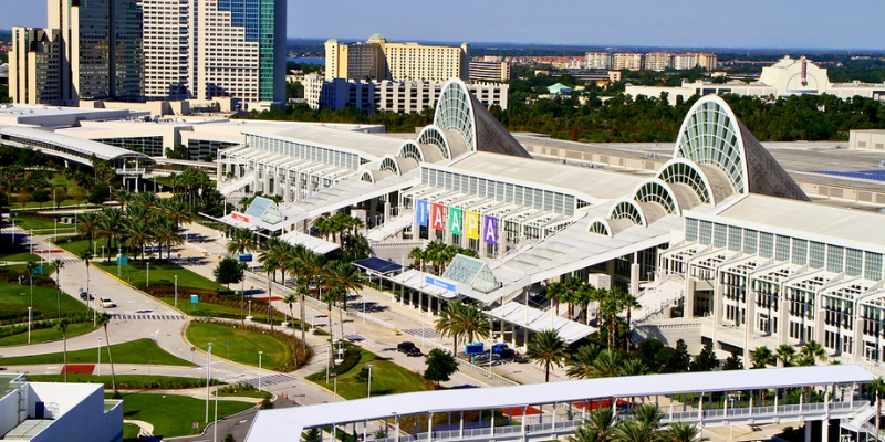 Exterior view of the Orlando Convention Center, highlighting its design and nearby attractions.