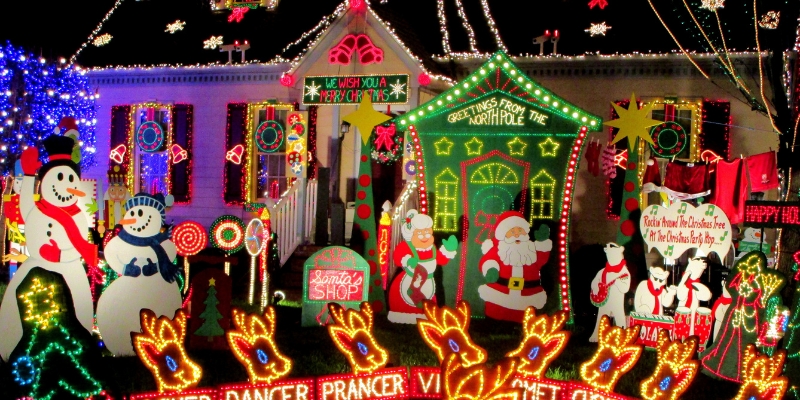 A festive house in Downtown Orlando, illuminated with Christmas lights and decorations for the Winter on the Avenue celebration.